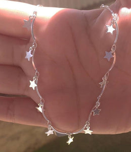 CHOKER ESTRELA 37 CM COM EXTENSOR DE 5 CM CHEGANDO A MEDIR 42 CM